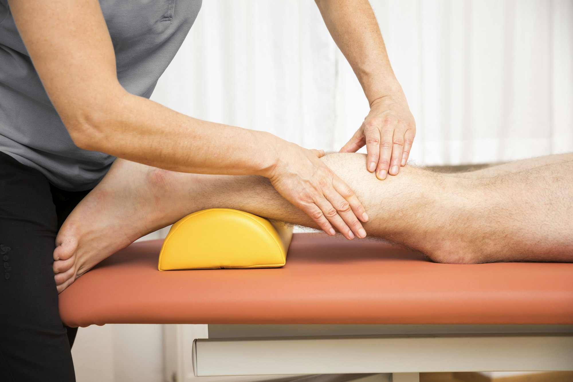 young man at the physio therapy